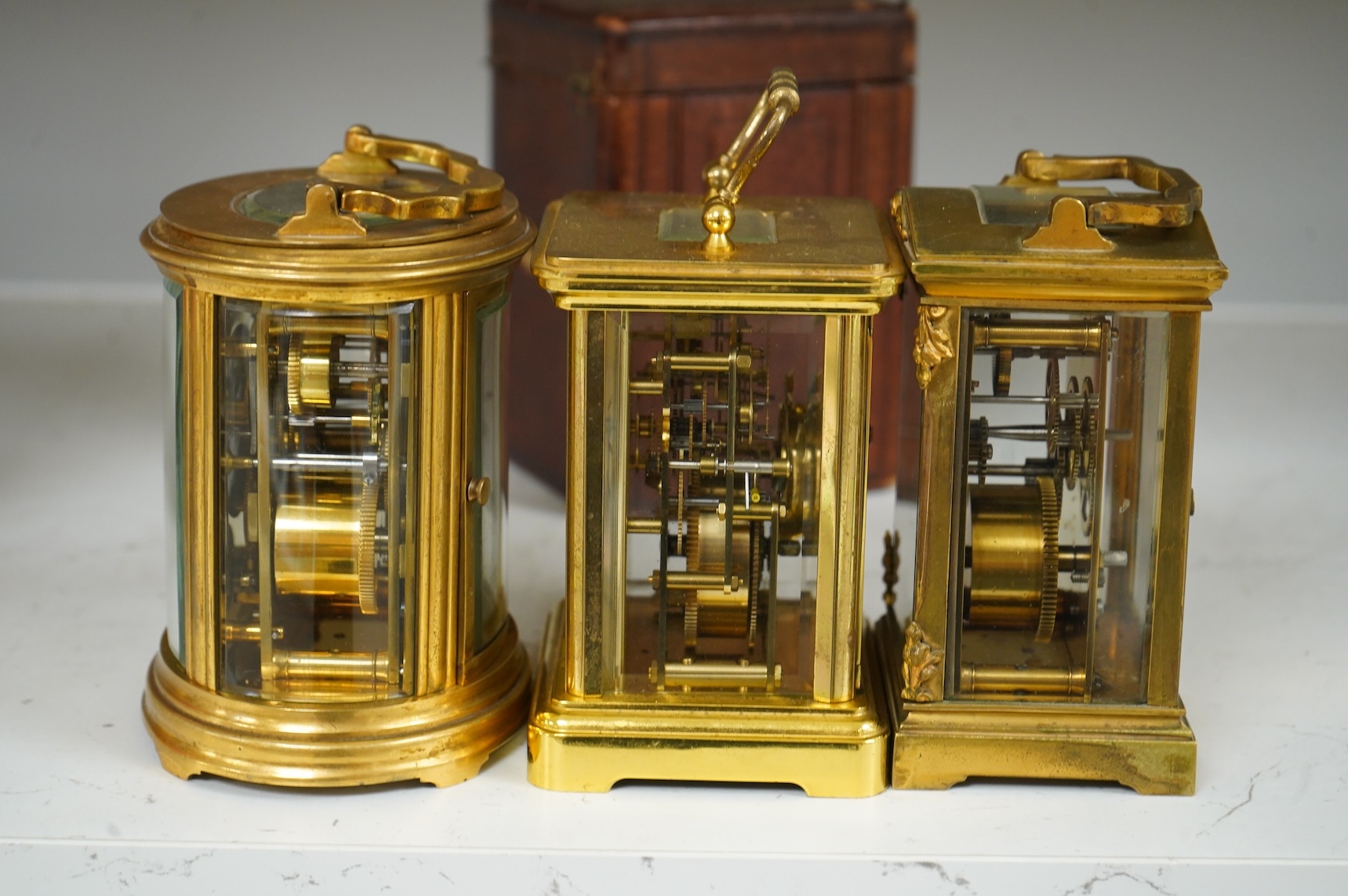 Two carriage clocks and a timepiece, tallest 12.5cm